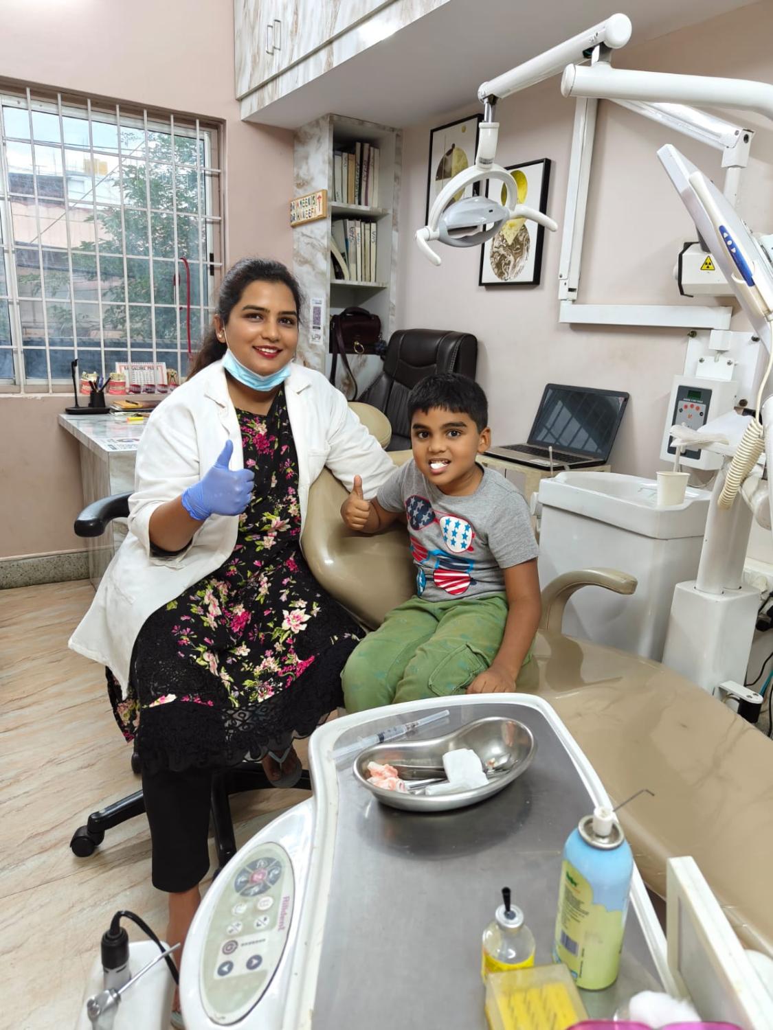 Dr. Haneefa with happy young patient